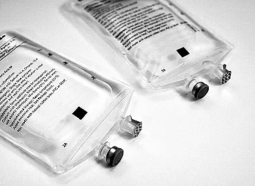 Two nondescript 100 mL IV bags.